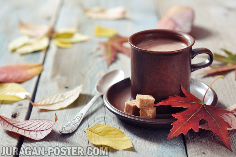 A cup of coffee on the autumn background Jual Poster di 