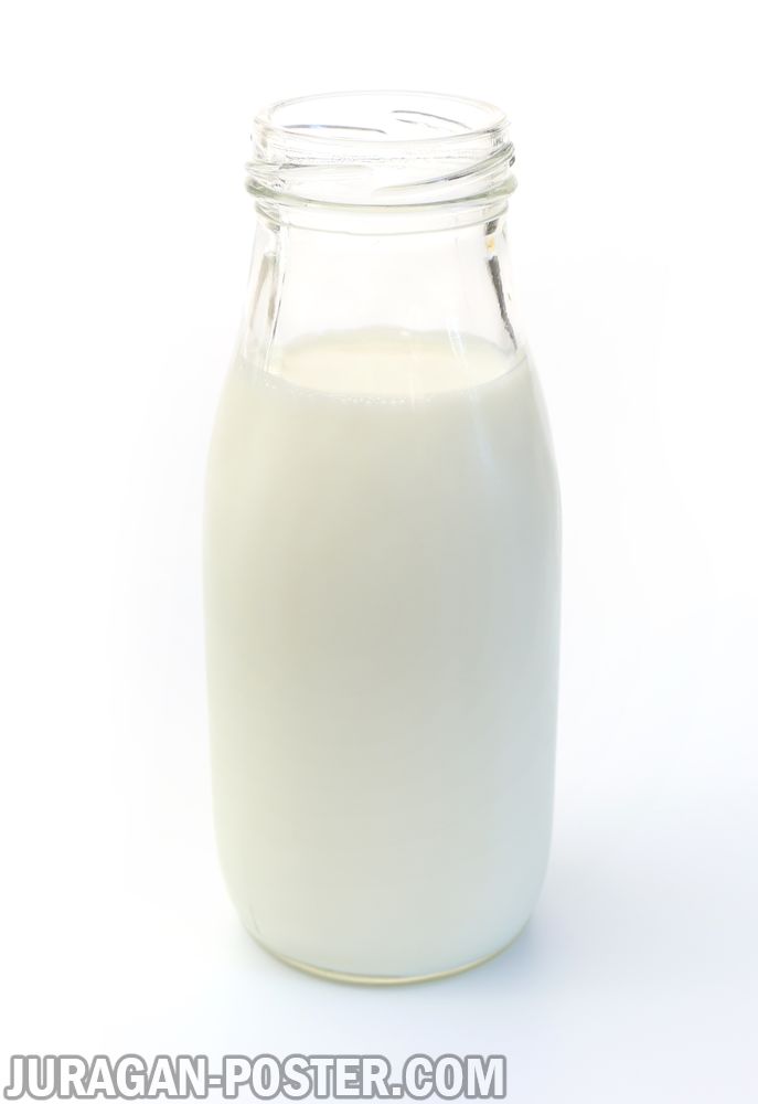 Milk of cow in glass and jug and dairy products Jual 